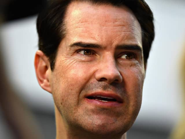 SINGAPORE - SEPTEMBER 16:  British comedian Jimmy Carr looks on in the Paddock before the Formula One Grand Prix of Singapore at Marina Bay Street Circuit on September 16, 2018 in Singapore.  (Photo by Clive Mason/Getty Images)