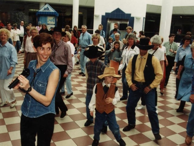 Line dancers showing off their moves in 1997