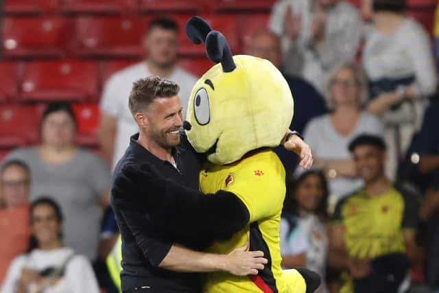 Rob Edwards, manager of Watford, celebrates the win over Sheffield United with club mascot Harry the Hornet (Marc Atkins/Getty Images)