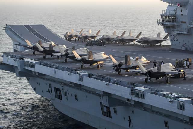 HMS Queen Elizabeth has embarked two squadrons of F-35B stealth jets: the UK's 617 Sqn and US Marine Corps fighter attack squadron 211. Alongside eight Merlin helicopters, it is the largest air group to operate from a Royal Navy carrier in more than thirty years, and the largest air group of fifth generation fighters at sea anywhere in the world.