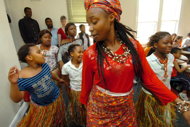 Youngsters learn West African Dance with Rose Bazzie (centre) at the Sadacca International Community Cultural Day - August 25, 2008.