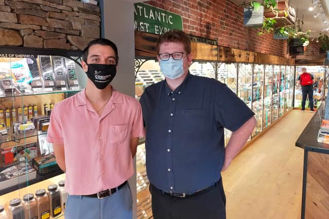 Craig and Dan of Rails of Sheffield say they had to pull their shutters down during the heavy rain on Wednesday.