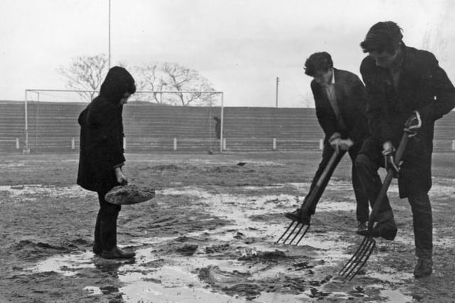 Standing and forking the Simonside Hall pitch to get it ready for the 1966 game against Halifax Town. Pictured are Kenneth Smith, Kenneth Sanders and Kenneth Irvin.