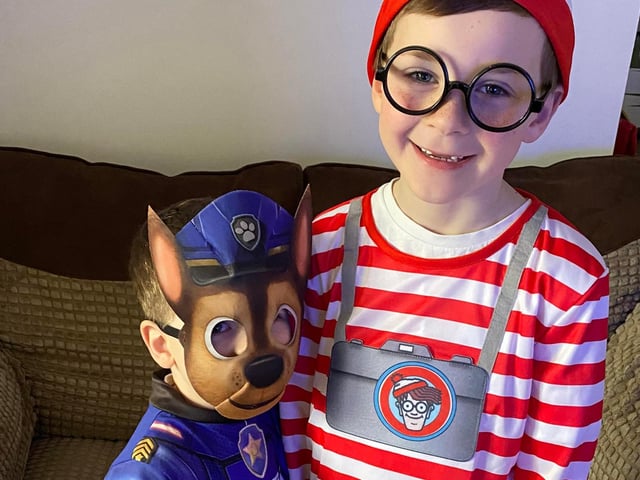 Alfie Couzens, 7, and Finley Couzens, 3, from Gosport dressed as Where's Wally (right) and Chase from Paw Patrol (left) respectively for World Book Day.