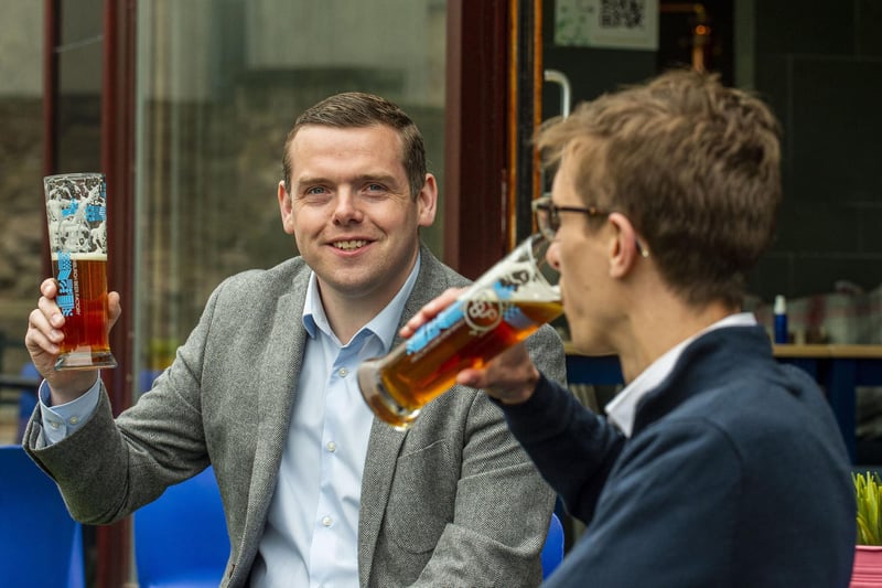 Leader of Scottish Conservatives Douglas Ross enjoys a pint of the Edinburgh Larger from the Edinburgh Brewing Company at 56 North in Newington, Edinburgh.