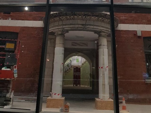The illuminated doorway to the new museum