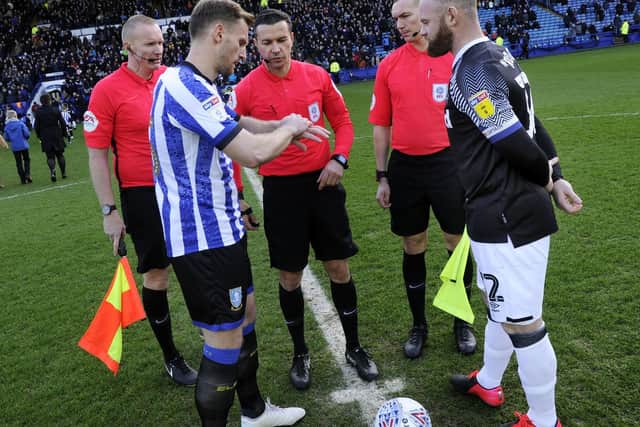 Sheffield Wednesday captain Tom Lees and Derby County skipper Wayne Rooney before the recent Championship match at Hillsborough. Picture: Steve Ellis