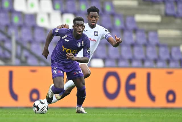Beerschot's Isamaila Cheikh Coulibaly and Anderlecht's Albert Sambi Lokonga fight for the ball: JOHAN EYCKENS/BELGA MAG/AFP via Getty Images