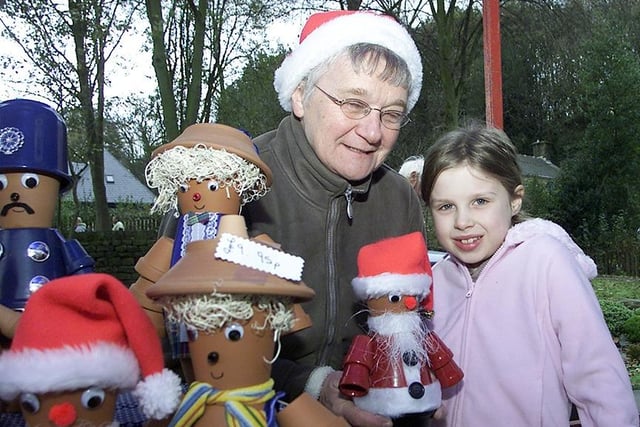 The festive flowerpot men were a big hit on Sue Moffatt's stand at the Oughtibridge Christmas Market as Lucy Bestwick found out in November 2005