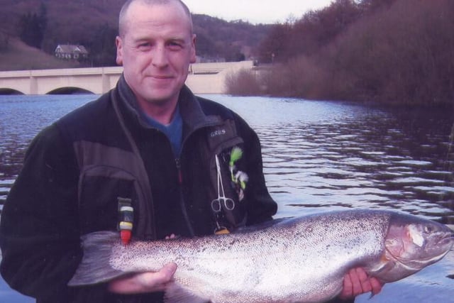Kevin Bryan, of Stockport, with the 14lb 4oz rainbow trout he caught at Ladybower Reservoir  in 2007