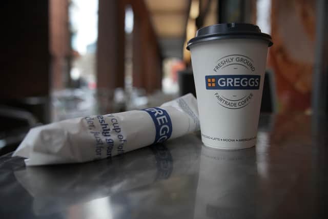 Greggs disposable coffee cup and sausage roll (Photo illustration by Christopher Furlong/Getty Images)