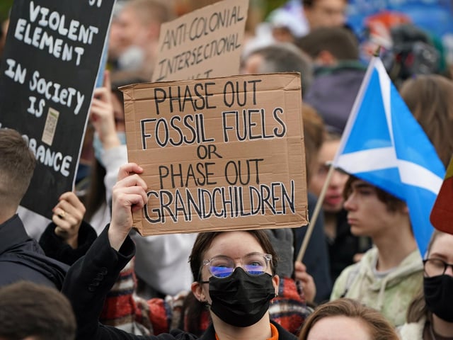 Some of the many placards on display during the rally.