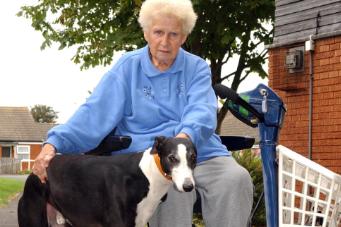 Annie Bailey, aged 79, with her dog Rebel who helped to save her life when she fell into the River Don in 2004.