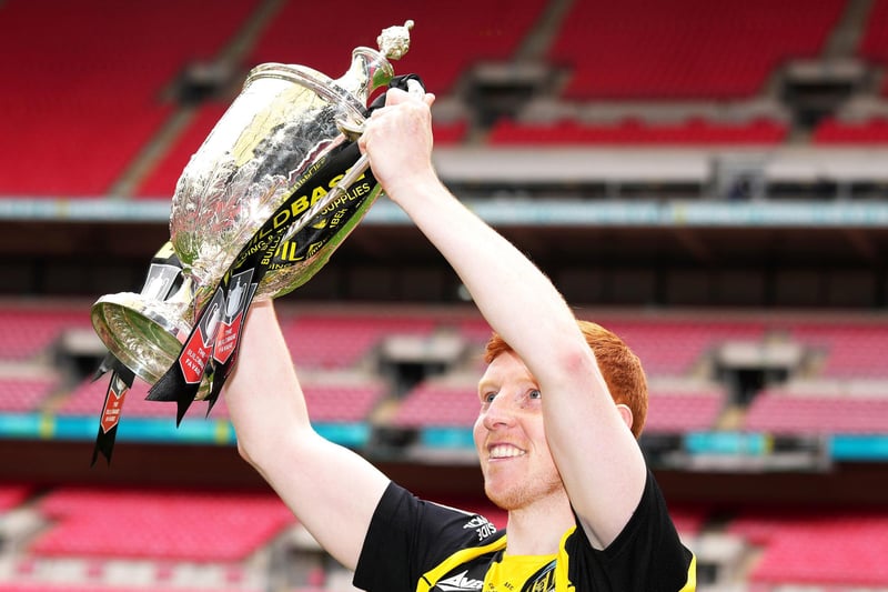 Hebburn Town's Michael Richardson celebrates with lifting the Buildbase FA Vase 2019/20 Trophy after victory in the Final at Wembley Stadium, London.