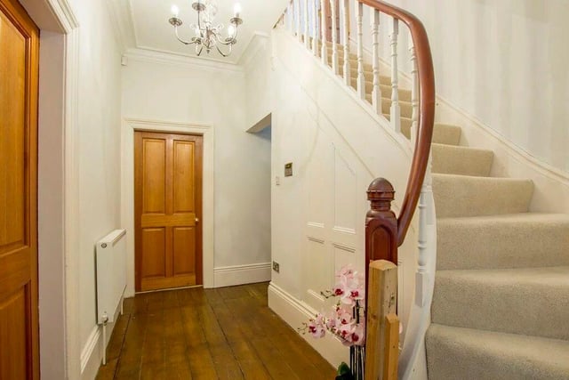 Tasteful stained floorboards are among the property's selling points.