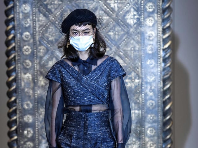 A model wears a creation by Christian Dior's during a fitting session
