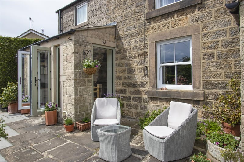 The property enjoys an "idyllic" village location, on the edge of the Peak District National Park.