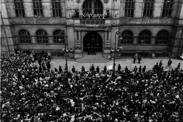 Huge crowds cheer the Wednesday players and staff on the balcony at Sheffield Town Hall following their FA Cup final defeat to Everton in May 1966.