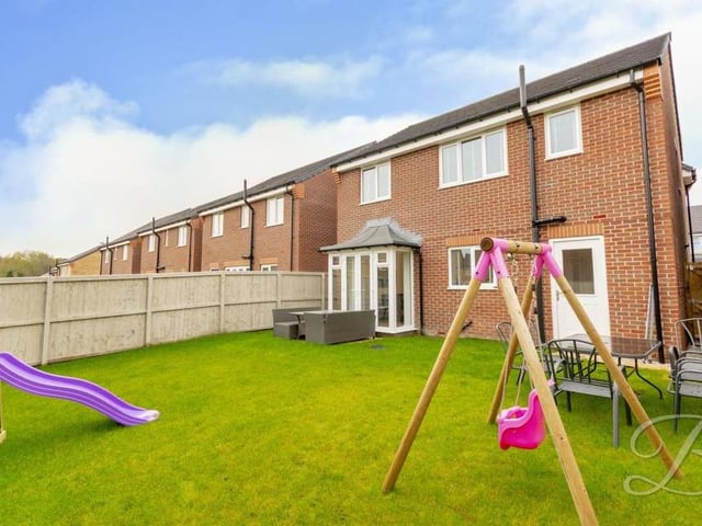 The garden can be put to many uses. There is room for the adults to sit and relax but also room for the children to play.