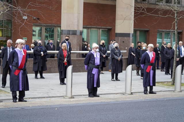 Judges, court officials and staff pay their respects to long standing 'court watcher' Andrew Mollison as his funeral cortege passes  Sheffield Crown Court. Picture Scott Merrylees