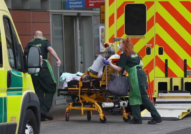 A patient is brought into the Royal London Hospital - PA