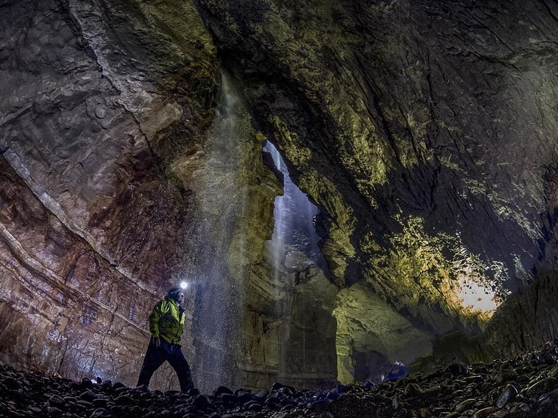 One of the UK's most famous caves, this cavern is so massive it could fit an entire cathedral inside. Twice a year, local winch clubs lower visitors 300 feet down into its depths for a truly subterranean adventure.