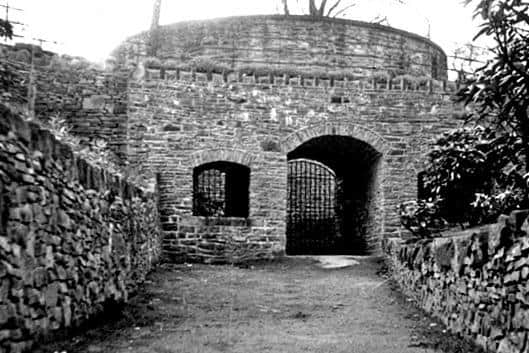 An old picture of the bear pit, which is a listed structure