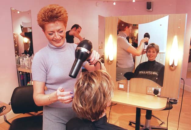 Pictured at the Linda Price and Robert Taylor Salon, Ecclesall Road, Sheffield, where  Caroline Hill is seen working on the hair of Joanne Atherley in 1999