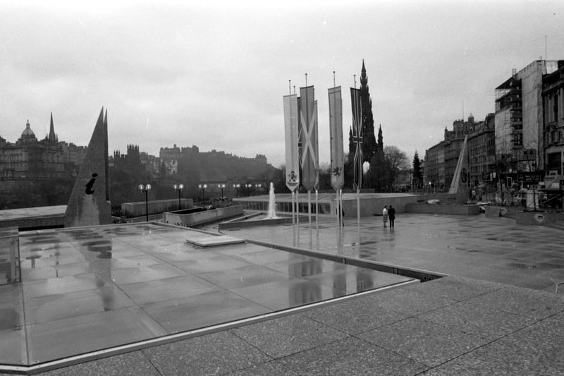 Looking across the plaza of the new Waverley Market on Edinburgh's Princes Street, November 1984. Also in picture Edinburgh Castle and to left, the Information centre 'fin.'