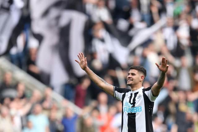 Bruno Guimaraes of Newcastle United celebrates after victory in the Premier League match between Newcastle United and Leicester City at St. James Park on April 17, 2022 in Newcastle upon Tyne, England. (Photo by George Wood/Getty Images)