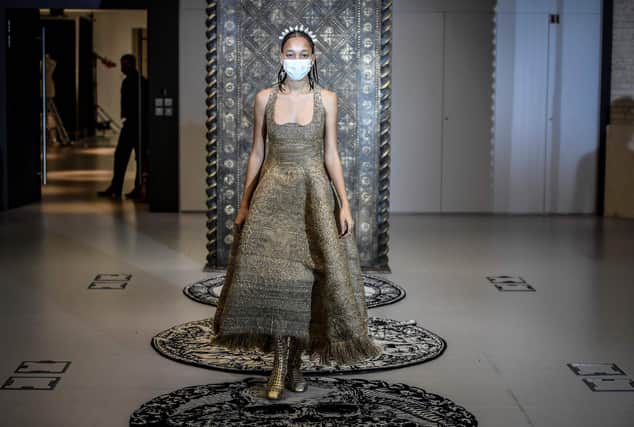 A model wears a creation by Christian Dior's during a fitting session at Christian Dior's Haute Couture fashion house in Paris