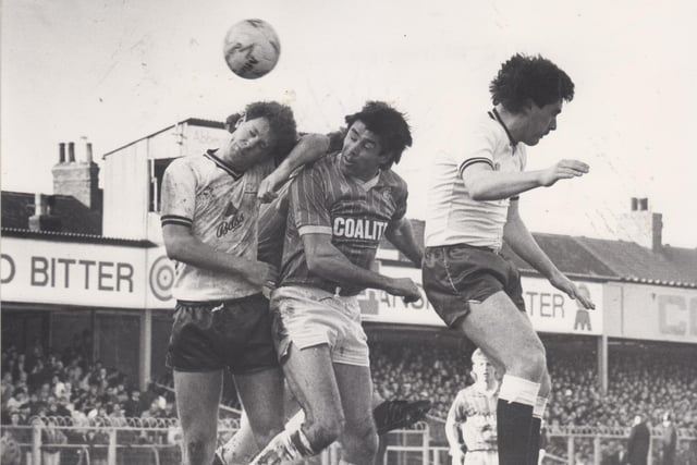 Pictured challenging for a header against Derby in February 1986.
