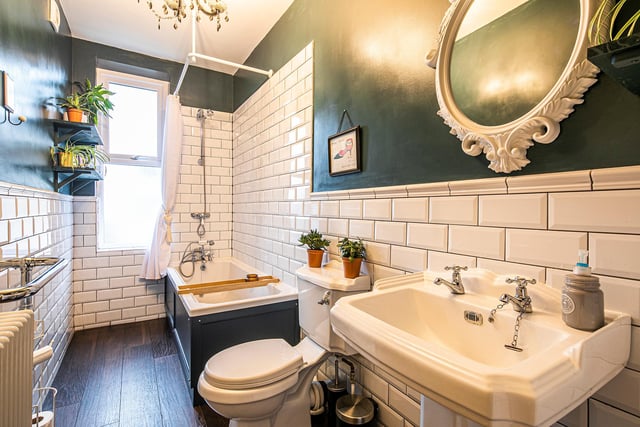 The bathroom has been given a fashionable look with 'metro tiles' that also hark back to the past.