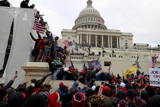 Protesters gathered outside the U.S. Capitol Building during a joint session Congress to ratify President-elect Joe Biden's 306-232 Electoral College win over President Donald Trump.  (Photo by Tasos Katopodis/Getty Images)