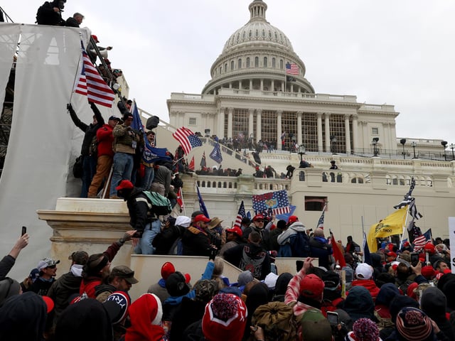 Protesters gathered outside the U.S. Capitol Building during a joint session Congress to ratify President-elect Joe Biden's 306-232 Electoral College win over President Donald Trump. (Photo by Tasos Katopodis/Getty Images)