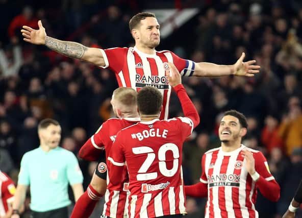 Billy Sharp celebrates after scoring his and Sheffield United's second goal against West Brom: Simon Bellis / Sportimage