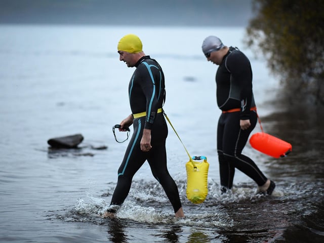 Open water swimming enthusiasts enjoy an early morning swim in Loch Lomond, Trossachs, Scotland. A new study from the UK Dementia Research Institute found that the blood of regular winter swimmers contains a "cold-shock" protein that wasn't found in that of people who did other cold-weather exercise on dry land. This protein has elsewhere been shown to slow the onset of dementia and even repair damage it causes in mice.