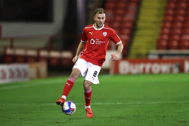 BARNSLEY, ENGLAND - JANUARY 16: Herbie Kane of Barnsley controls the ball during the Sky Bet Championship match between Barnsley and Swansea City at Oakwell Stadium on January 16, 2021 in Barnsley, England. Sporting stadiums around the UK remain under strict restrictions due to the Coronavirus Pandemic as Government social distancing laws prohibit fans inside venues resulting in games being played behind closed doors. (Photo by George Wood/Getty Images)