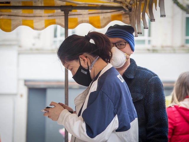 Shoppers wearing face masks in Commercial Road on March 20 before lockdown began.