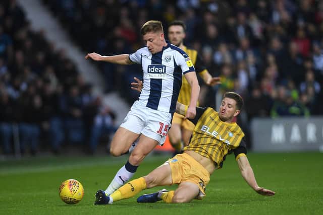 Harvey Barnes (left) here being tackled by Sheffield Wednesday's Sam Hutchinson had a very productive loan spell under Darren Moore at West Brom