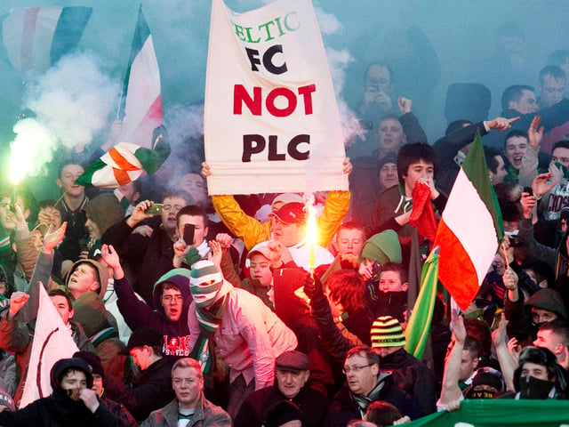 Celtic fans take aim at the board during a Scottish Cup match at Berwick Rangers in January 2011