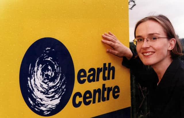 Penni Mawson with the new logo of the Earth Centre before it opened