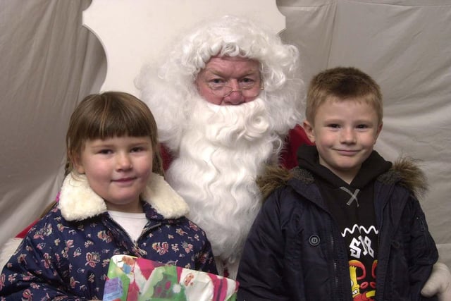 Pictured at Crystal Peaks, where Santa John Spotswood is seen in his grotto with children Alex 5, and Jamie 6 Watts