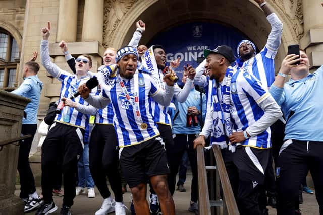 Sheffield Wednesday players got the party started as they paraded through the city. Picture: Richard Sellers/PA Wire.