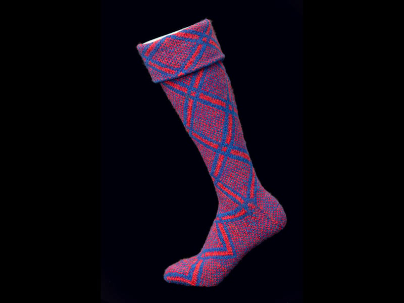This mid-19th Century pattern was developed by a work scheme which supported Gairloch tenants during the 1840s potato famine. Knitting
was encouraged by Lady Mackenzie of Gairloch to provide an income for  women, using wool from local fleece which was then home spun and dyed with local plants.