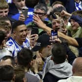 COMEBACK HERO: Liam Palmer celebrates with Sheffield Wednesday fans after Peterborough United are beaten in a penalty shoot-out