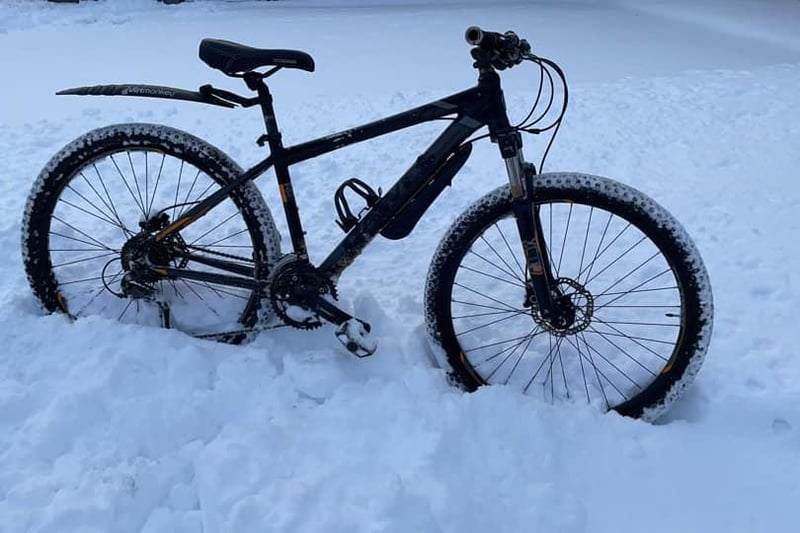 Two wheels in the snow in Carron Shore  (Picture: Cammy McKee)