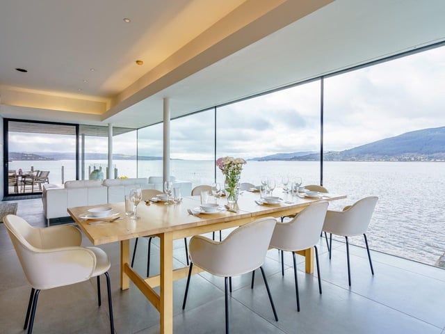 The dining area is one part of the open-plan living space.