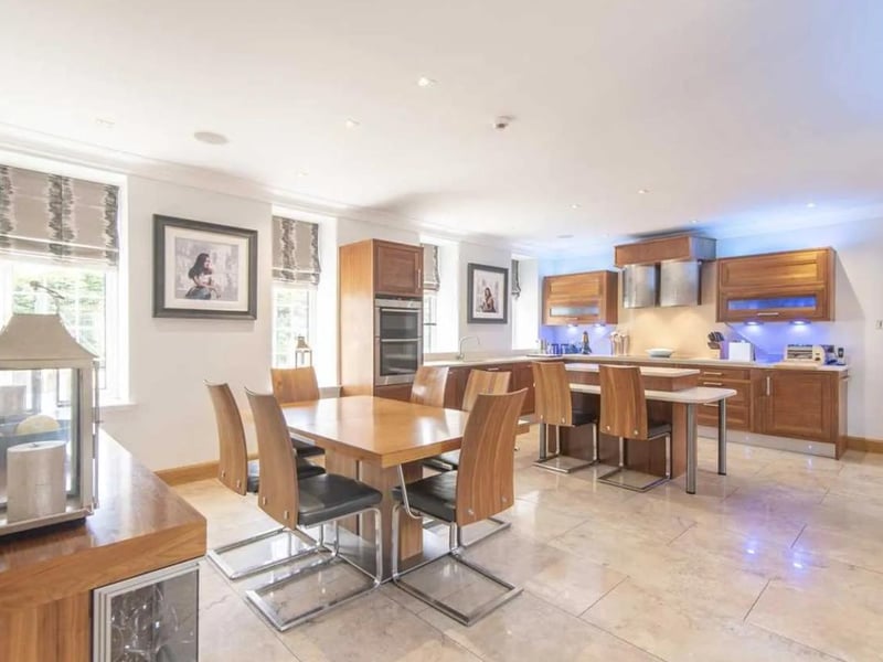 This gorgeous six bedroom house in Dollar, Clackmannanshire, includes over six acres of garden and woodland, a tennis court, an eight-car garage and also a separate self-contained cottage. It's on the market for offers over £2,250,000.