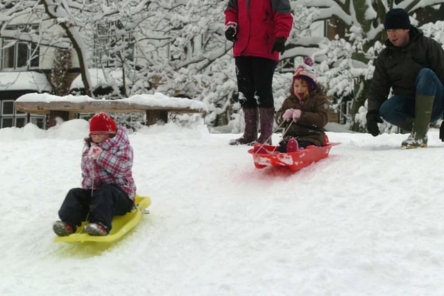 Sledging in Bingham Park, Daisy Godbehere(4) and Eve Alcock(6) on 1 December 2010. Photo by Roger Nadal.